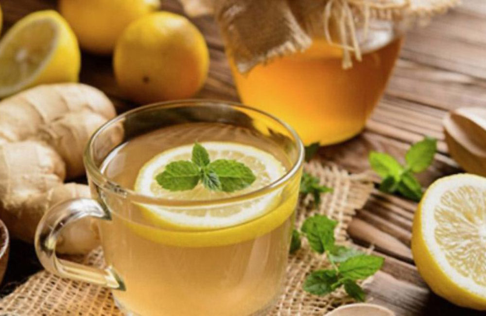 Benefits of warm water with lemon and on sale honey