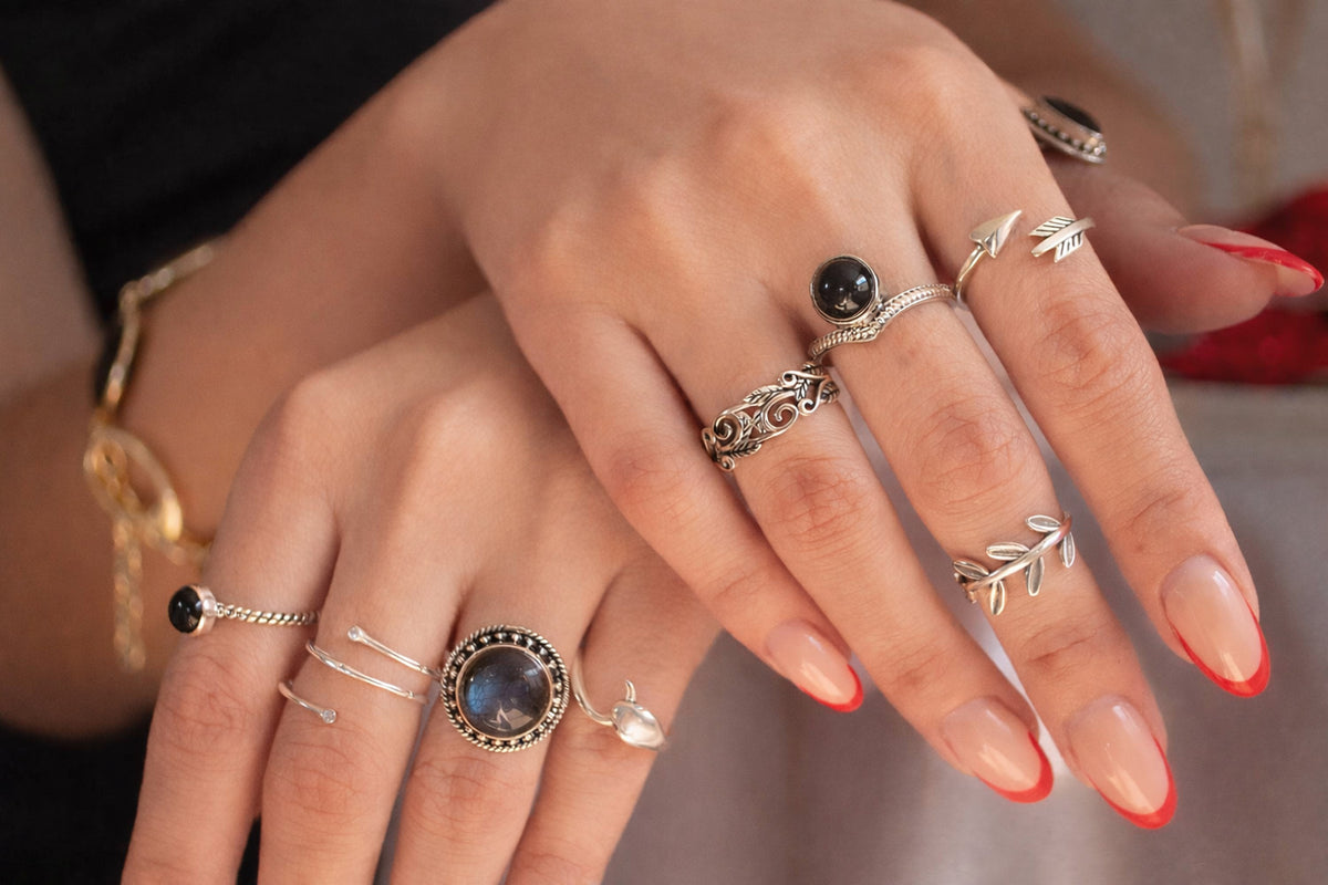 Sivalya gemstone rings worn on a hand